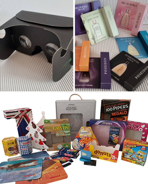 Todos los sectores Caja de cartón con lentes de realidad virtual y varios productos de diferentes marcas.